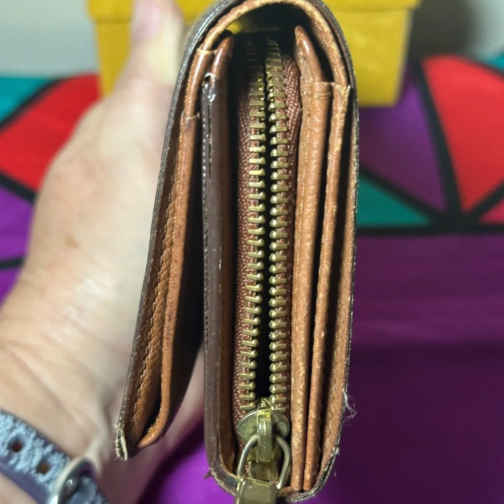 Louis Vuitton wallet.